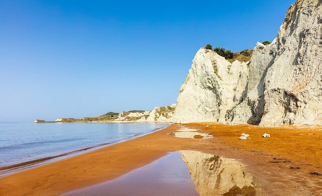 Xi beach is definitely one of the most famous beaches in Kefalonia characterized by its white rocky hills that surround the beach and the reddish brown sand